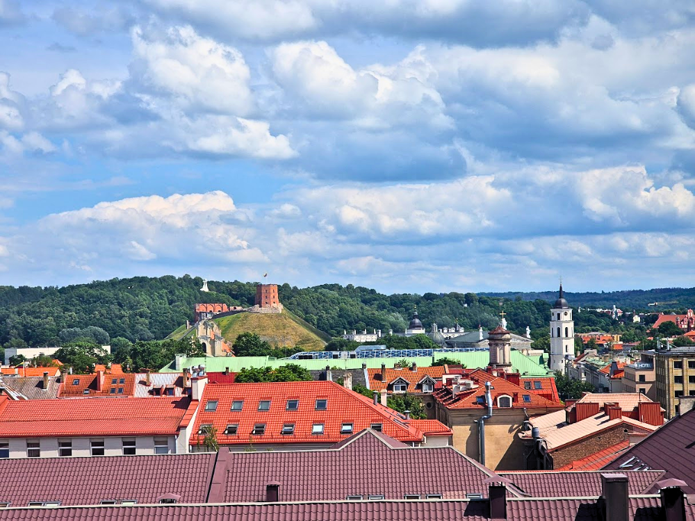 Panoramic view of Vilnius showing Gediminas Castle Tower, the Hill of Three Crosses, the Cathedral Square bell tower and rooftops of the Old Town.